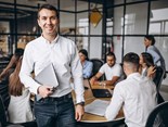 group-of-people-working-out-business-plan-in-an-office